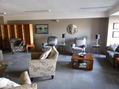 105-4805 45 Street, Red Deer, AB - Indoor Photo Showing Living Room