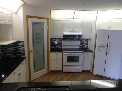 105-4805 45 Street, Red Deer, AB - Indoor Photo Showing Kitchen With Double Sink