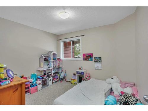 1206-5220 50A Avenue, Sylvan Lake, AB - Indoor Photo Showing Bedroom