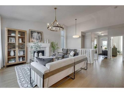 12 Treeline Lane Sw, Calgary, AB - Indoor Photo Showing Living Room With Fireplace