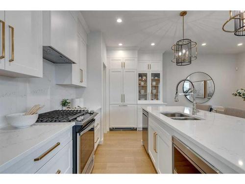 12 Treeline Lane Sw, Calgary, AB - Indoor Photo Showing Kitchen With Double Sink With Upgraded Kitchen