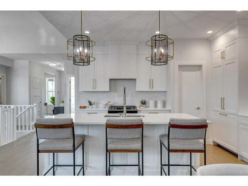 12 Treeline Lane Sw, Calgary, AB - Indoor Photo Showing Kitchen With Double Sink