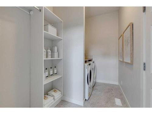 12 Treeline Lane Sw, Calgary, AB - Indoor Photo Showing Laundry Room