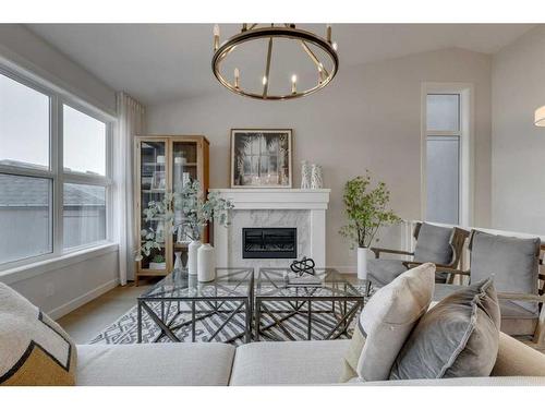 12 Treeline Lane Sw, Calgary, AB - Indoor Photo Showing Living Room With Fireplace