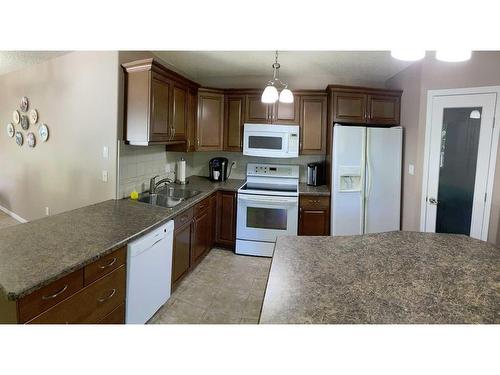 43169 Range Road 215, Rural Camrose County, AB - Indoor Photo Showing Kitchen With Double Sink