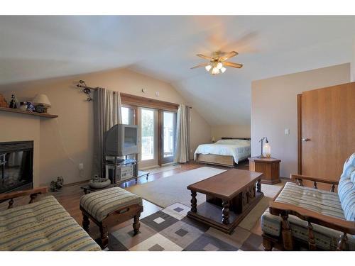 27 Lakeshore Drive, Sundance Beach, AB - Indoor Photo Showing Living Room With Fireplace