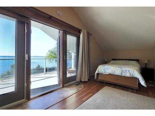 27 Lakeshore Drive, Sundance Beach, AB - Indoor Photo Showing Bedroom