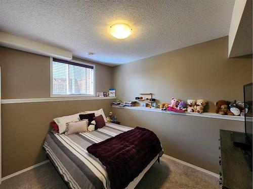 91 Isherwood Close, Red Deer, AB - Indoor Photo Showing Bedroom