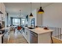 51 Rancher'S View East, Okotoks, AB  - Indoor Photo Showing Kitchen With Upgraded Kitchen 