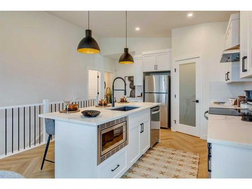 51 Rancher'S View East, Okotoks, AB - Indoor Photo Showing Kitchen With Stainless Steel Kitchen With Upgraded Kitchen