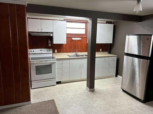 2309 Richmond Road Sw, Calgary, AB - Indoor Photo Showing Kitchen With Double Sink