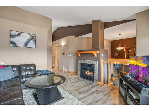 135 Jennings Crescent, Red Deer, AB - Indoor Photo Showing Living Room With Fireplace