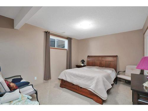 4851 56 Avenue, Innisfail, AB - Indoor Photo Showing Bedroom