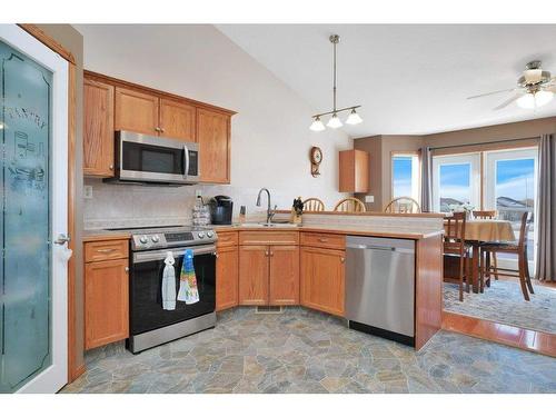 4851 56 Avenue, Innisfail, AB - Indoor Photo Showing Kitchen With Double Sink