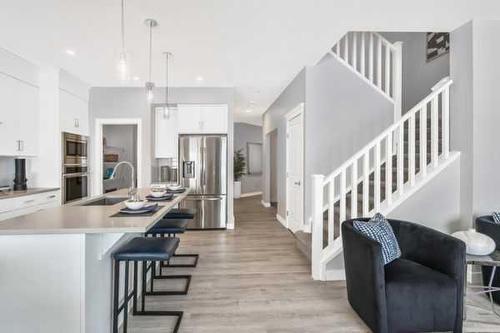 274 Creekstone Hill Sw, Calgary, AB - Indoor Photo Showing Kitchen With Upgraded Kitchen