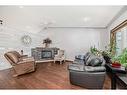 5 Laurel Close, Sylvan Lake, AB  - Indoor Photo Showing Living Room With Fireplace 