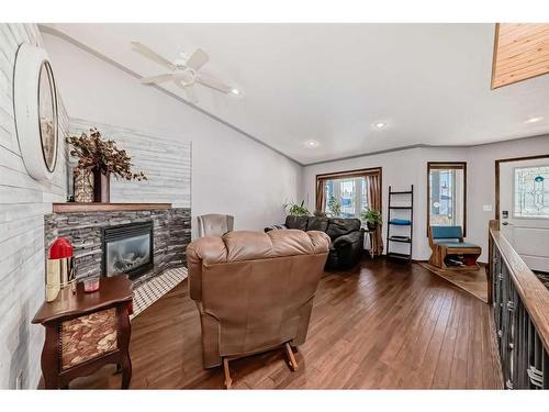 5 Laurel Close, Sylvan Lake, AB - Indoor Photo Showing Living Room With Fireplace