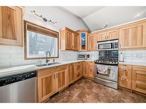 5 Laurel Close, Sylvan Lake, AB - Indoor Photo Showing Kitchen With Stainless Steel Kitchen With Double Sink