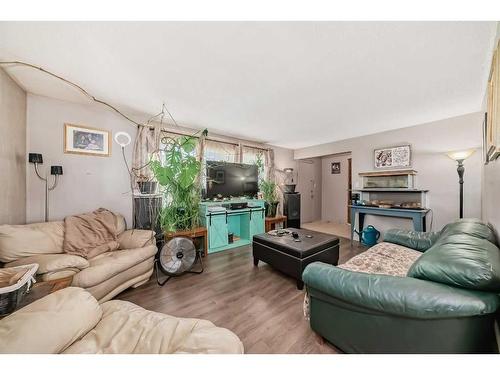 3952 52 Avenue, Red Deer, AB - Indoor Photo Showing Living Room With Fireplace