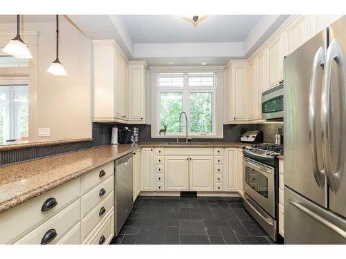 244 Canal Street, Rural Ponoka County, AB - Indoor Photo Showing Kitchen With Double Sink