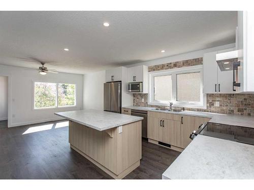 5040 56A Street, Lacombe, AB - Indoor Photo Showing Kitchen With Double Sink