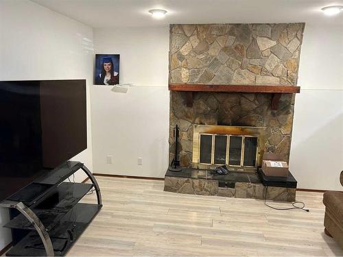 7 Cole Street, Red Deer, AB - Indoor With Fireplace