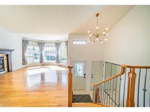 51 Ackerman Crescent, Red Deer, AB - Indoor Photo Showing Other Room With Fireplace