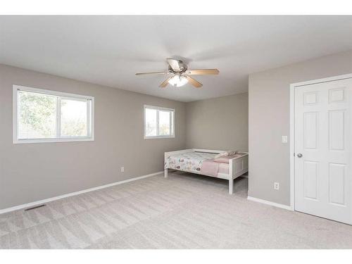 57-73 Addington Drive, Red Deer, AB - Indoor Photo Showing Bedroom