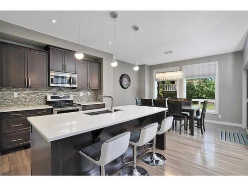 4 Cranna Place, Lacombe, AB - Indoor Photo Showing Kitchen With Upgraded Kitchen