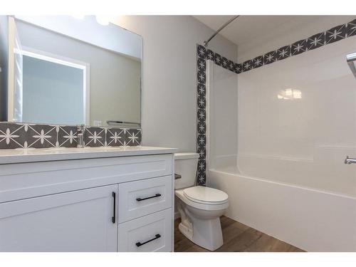 16 Trinity Street, Lacombe, AB - Indoor Photo Showing Bathroom