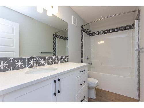 16 Trinity Street, Lacombe, AB - Indoor Photo Showing Bathroom