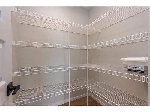 16 Trinity Street, Lacombe, AB - Indoor With Storage