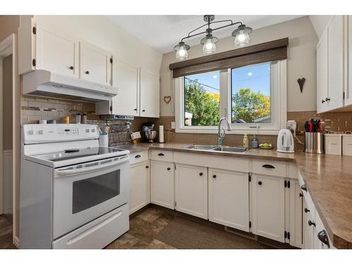 4609 45 Street, Camrose, AB - Indoor Photo Showing Kitchen With Double Sink