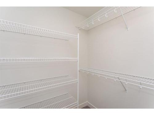 52 Trinity Street, Lacombe, AB - Indoor With Storage