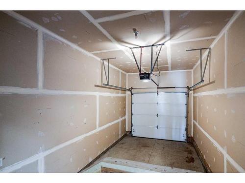 158 Hampton Close, Penhold, AB - Indoor Photo Showing Garage