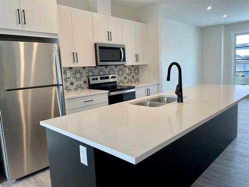 361 Spruce Street, Springbrook, AB - Indoor Photo Showing Kitchen With Double Sink With Upgraded Kitchen