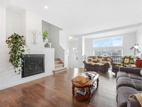 388 Stout Lane, Leduc, AB - Indoor Photo Showing Living Room With Fireplace