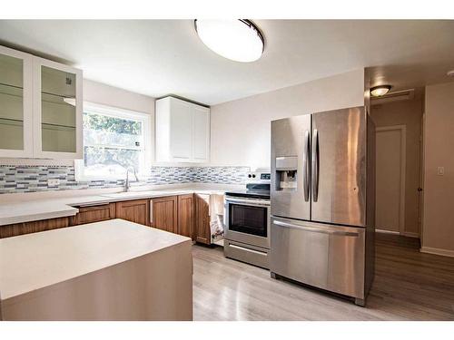 4606 41 Avenue, Red Deer, AB - Indoor Photo Showing Kitchen With Double Sink