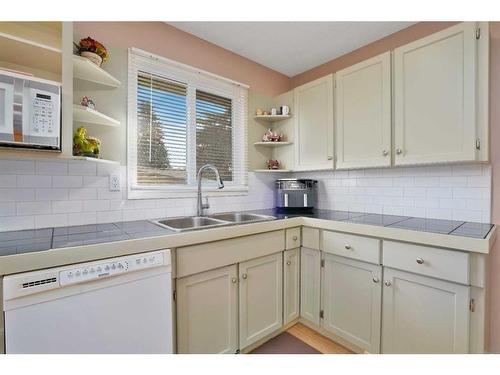 23 Norris Close, Red Deer, AB - Indoor Photo Showing Kitchen With Double Sink