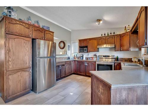 27 Kirby Street, Red Deer, AB - Indoor Photo Showing Kitchen With Stainless Steel Kitchen With Double Sink