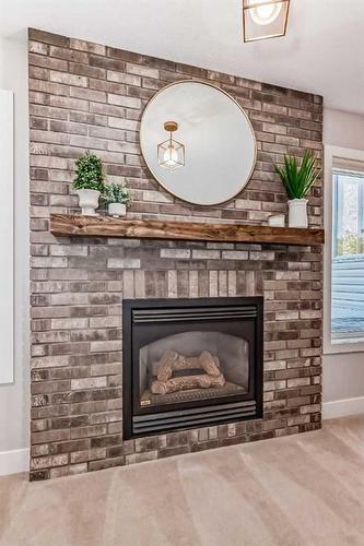 14 Doran Crescent, Red Deer, AB - Indoor Photo Showing Living Room With Fireplace