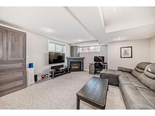 14 Doran Crescent, Red Deer, AB - Indoor Photo Showing Living Room With Fireplace