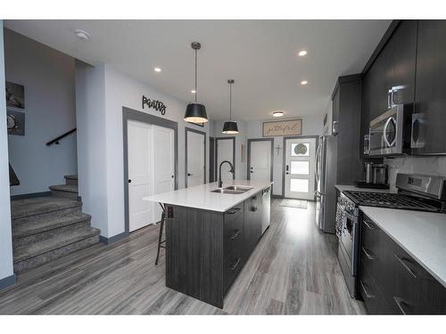 26 Earl Close, Red Deer, AB - Indoor Photo Showing Kitchen With Double Sink With Upgraded Kitchen