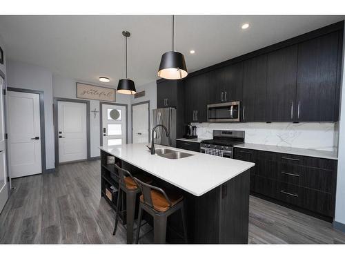 26 Earl Close, Red Deer, AB - Indoor Photo Showing Kitchen With Double Sink With Upgraded Kitchen