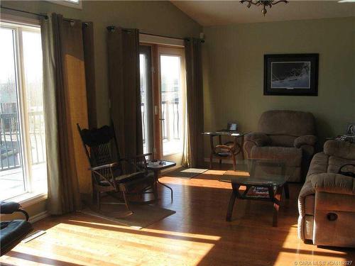 4021-25054 South Pine Lake Road, Rural Red Deer County, AB - Indoor Photo Showing Living Room