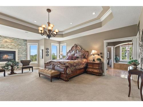 37321 Range Road 265, Rural Red Deer County, AB - Indoor Photo Showing Bedroom With Fireplace