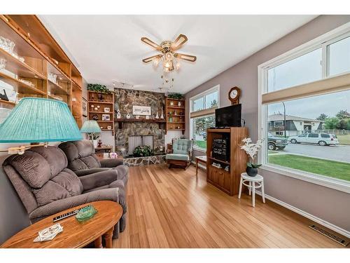 16 Cameron Crescent, Red Deer, AB - Indoor Photo Showing Living Room With Fireplace