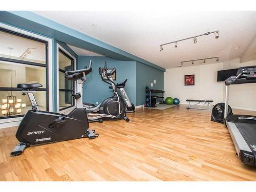 306-5110 36 Street, Red Deer, AB - Indoor Photo Showing Gym Room