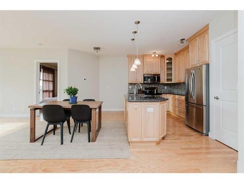 306-5110 36 Street, Red Deer, AB - Indoor Photo Showing Kitchen With Stainless Steel Kitchen