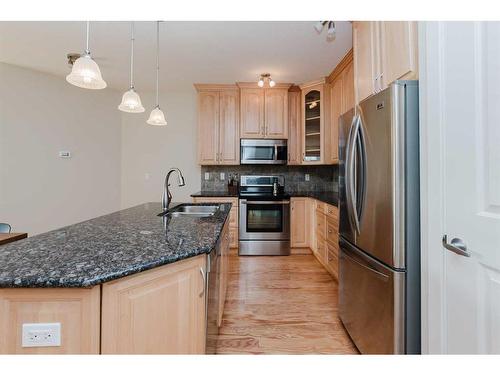 306-5110 36 Street, Red Deer, AB - Indoor Photo Showing Kitchen With Stainless Steel Kitchen With Upgraded Kitchen